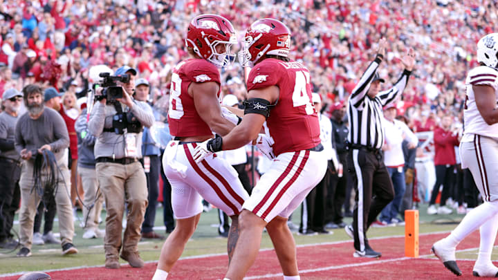 Nov 1, 2025; Fayetteville, Arkansas, USA; Arkansas Razorbacks tight end Rohan Jones (88) celebrates with tight end Maddox Lassiter (47) after scoring a touchdown in the second quarter against the Mississippi State Bulldogs at Donald W. Reynolds Razorback Stadium. Mandatory Credit: Nelson Chenault-Imagn Images Nov 1, 2025; Fayetteville, Arkansas, USA; Arkansas Razorbacks tight end Rohan Jones (88) celebrates with tight end Maddox Lassiter (47) after scoring a touchdown in the second quarter against the Mississippi State Bulldogs at Donald W. Reynolds Razorback Stadium. Mandatory Credit: Nelson Chenault-Imagn Images