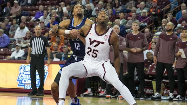 Virginia Tech Hokies forward Justyn Mutts boxes out for a rebound in the Charleston Classic.