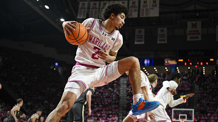 Feb 1, 2026; College Park, Maryland, USA;  Maryland Terrapins guard Myles Rice (2) rebounds during the first half Purdue Boilermakers at Xfinity Center.