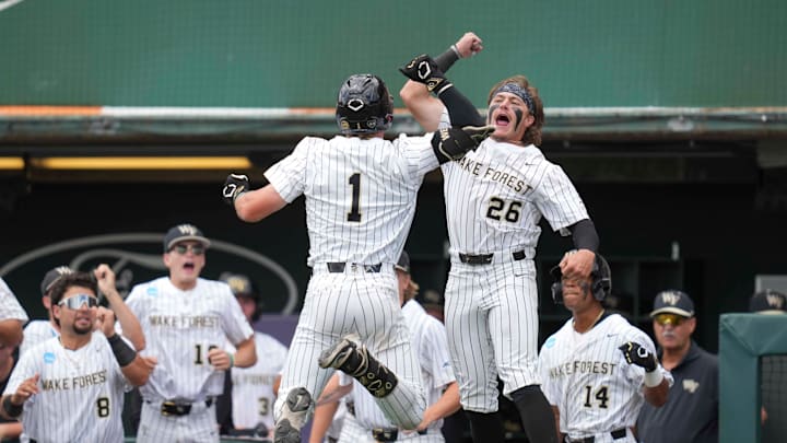 Wake Forest infielder Dalton Wentz (1) and Wake Forest outfielder Matt Scannell (26) celebrate after Wentz hits a home run during a NCAA regional baseball game between Cincinnati and Wake Forest at Lindsey Nelson Stadium in Knoxville, Tenn., on May 30, 2025.
