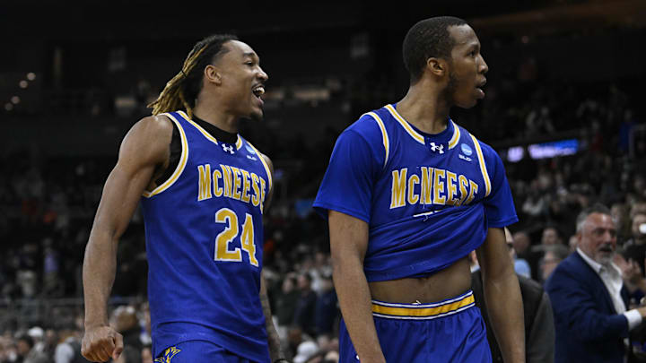 McNeese forward Christian Shumate (24) celebrates with guard Quadir Copeland (11) after defeating Clemson on Thursday.