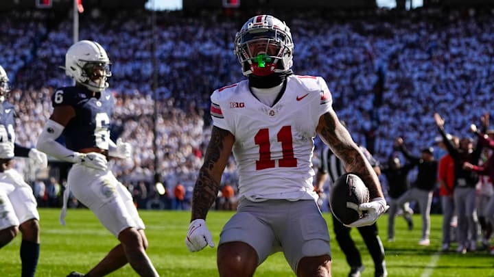 Ohio State Buckeyes wide receiver Brandon Inniss (11) celebrates a touchdown catch during the first half of the NCAA football game against the Penn State Nittany Lions at Beaver Stadium in University Park, Pa. on Saturday, Nov. 2, 2024.