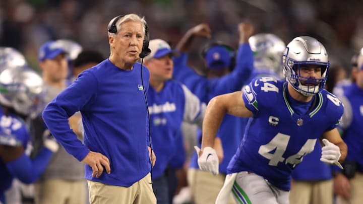 Seattle Seahawks head coach Pete Carroll (left) looks on during the first half against the Dallas Cowboys at AT&T Stadium. 