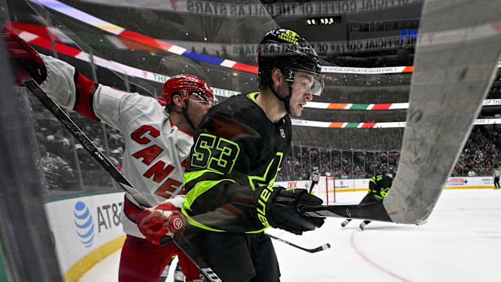 Jan 21, 2025; Dallas, Texas, USA; Carolina Hurricanes left wing Jordan Martinook (48) and Dallas Stars center Wyatt Johnston (53) look for the puck in the Dallas zone during the third period at the American Airlines Center. Mandatory Credit: Jerome Miron-Imagn Images Jan 21, 2025; Dallas, Texas, USA; Carolina Hurricanes left wing Jordan Martinook (48) and Dallas Stars center Wyatt Johnston (53) look for the puck in the Dallas zone during the third period at the American Airlines Center. Mandatory Credit: Jerome Miron-Imagn Images