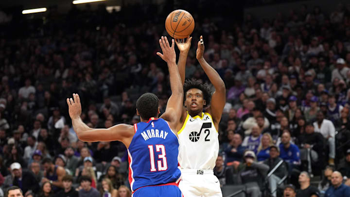 Nov 16, 2024; Sacramento, California, USA; Utah Jazz guard Collin Sexton (2) shoots against Sacramento Kings forward Keegan Murray (13) during the fourth quarter at Golden 1 Center. Mandatory Credit: Darren Yamashita-Imagn Images Nov 16, 2024; Sacramento, California, USA; Utah Jazz guard Collin Sexton (2) shoots against Sacramento Kings forward Keegan Murray (13) during the fourth quarter at Golden 1 Center. Mandatory Credit: Darren Yamashita-Imagn Images