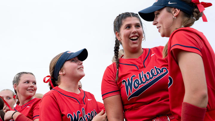 Kaylor West, second right, celebrates with her teammates after throwing a perfect game against Huntingdon in the Class AA State Softball Championship game at Middle Tennessee State University in Murfreesboro, Tenn., Friday, May 24, 2024.