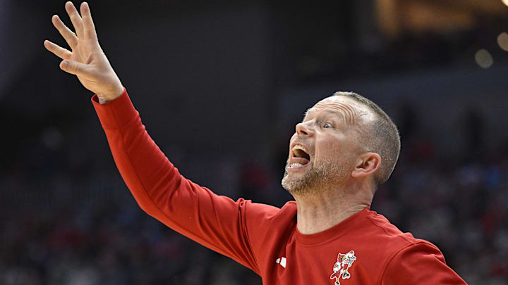 Jan 1, 2025; Louisville, Kentucky, USA;  Louisville Cardinals head coach Pat Kelsey calls out instructions during the first half against the North Carolina Tar Heels at KFC Yum! Center.