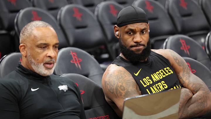 Nov 8, 2023; Houston, Texas, USA;  Los Angeles Lakers forward LeBron James (23) looks over video with assistant coach Phil Handy before playing against the Houston Rockets at Toyota Center. Mandatory Credit: Thomas Shea-USA TODAY Sports