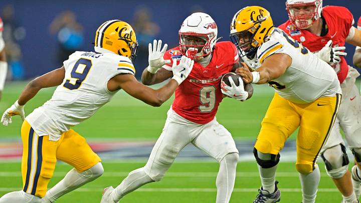 UNLV running back Jai'Den Thomas runs against Cal in the 2024 LA Bowl UNLV running back Jai'Den Thomas runs against Cal in the 2024 LA Bowl
