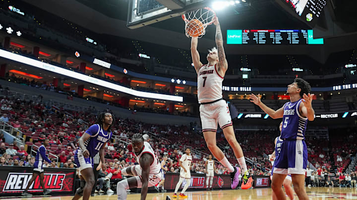 Louisville Cardinals forward Kasean Pryor (7) slams down two in the first half in the Cards' first exhibition game at the KFC Yum! Center in downtown Louisville, Ky. Oct. 21, 2024.