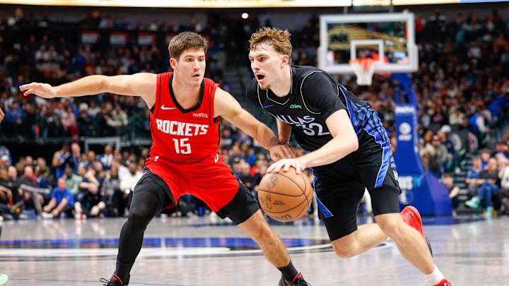 Dec 6, 2025; Dallas, Texas, USA; Dallas Mavericks forward Cooper Flagg (32) is guarded by Houston Rockets guard Reed Sheppard (15) during the fourth quarter at American Airlines Center. Mandatory Credit: Andrew Dieb-Imagn Images