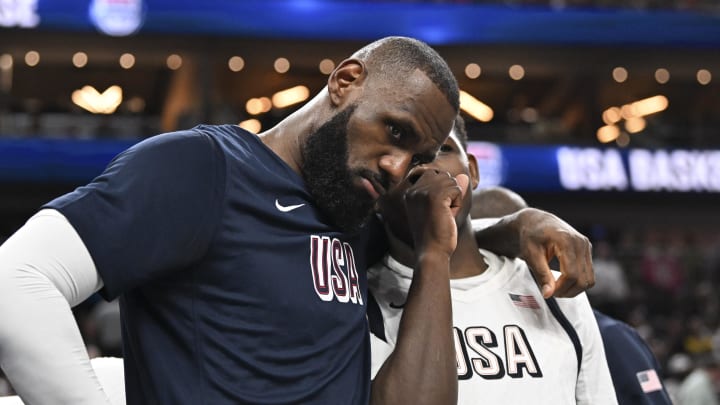 Jul 10, 2024; Las Vegas, Nevada, USA; USA forward Lebron James (6) and guard Anthony Edwards (5) speak on the bench in the fourth quarter against Canada in the USA Basketball Showcase at T-Mobile Arena. Mandatory Credit: Candice Ward-USA TODAY Sports Jul 10, 2024; Las Vegas, Nevada, USA; USA forward Lebron James (6) and guard Anthony Edwards (5) speak on the bench in the fourth quarter against Canada in the USA Basketball Showcase at T-Mobile Arena. Mandatory Credit: Candice Ward-USA TODAY Sports