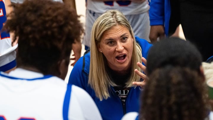 Bolles Bulldogs head coach Kelly Stevenson has words with her team during a timeout. The Rutherford Rams played the Bolles Bulldogs in the FHSAA Region 1-3A girls basketball final at Bolles School in Jacksonville, Fla. Friday night, February 21, 2025. Bolles defeated Rutherford 52-38. [Doug Engle/Florida Times-Union]2025