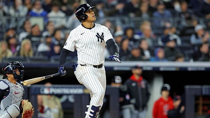 New York Yankees outfielder Juan Soto (22) hits a solo home run during the third inning against the Cleveland Guardians in game one of the ALCS for the 2024 MLB Playoffs at Yankee Stadium on Oct 14. New York Yankees outfielder Juan Soto (22) hits a solo home run during the third inning against the Cleveland Guardians in game one of the ALCS for the 2024 MLB Playoffs at Yankee Stadium on Oct 14.