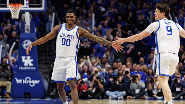Dec 11, 2024; Lexington, Kentucky, USA; Kentucky Wildcats guard Otega Oweh (0) fives forward Trent Noah (9) after Noah makes a three point basket during the second half against the Colgate Raiders at Rupp Arena at Central Bank Center. Mandatory Credit: Jordan Prather-Imagn Images