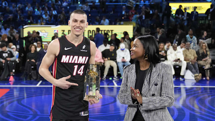 Feb 15, 2025; San Francisco, CA, USA; Miami Heat guard Tyler Herro (14) celebrates with the trophy after winning the three-point contest during All Star Saturday Night ahead of the 2025 NBA All Star Game at Chase Center. Mandatory Credit: Kyle Terada-Imagn Images