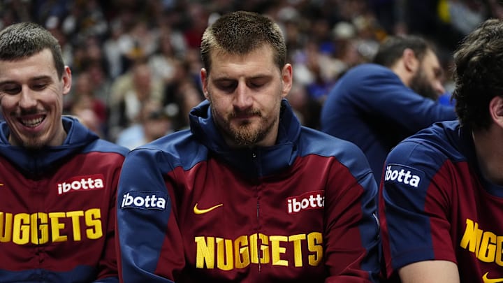 Apr 6, 2025; Denver, Colorado, USA; Denver Nuggets center Nikola Jokic (15) on the bench in the second quarter against the Indiana Pacers at Ball Arena. Mandatory Credit: Ron Chenoy-Imagn Images