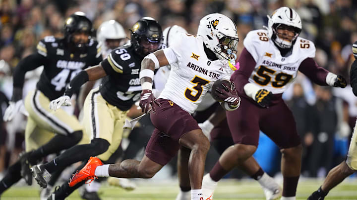 Nov 22, 2025; Boulder, Colorado, USA; Arizona State Sun Devils running back Raleek Brown (3) carries the ball in the first quarter against the Colorado Buffaloes at Folsom Field. Mandatory Credit: Ron Chenoy-Imagn Images
