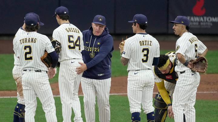 Milwaukee Brewers pitcher Robert Gasser (54) is relieved by manager Pat Murphy (49) during the fifth inning of their game against the Los Angeles Dodgers Saturday, May 23, 2026 at American Family Field in Milwaukee, Wisconsin.