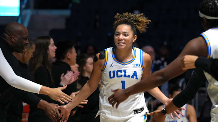 Dec 20, 2024; San Francisco, California, USA; UCLA Bruins guard Kiki Rice (1) is introduced before the game against the Creighton Bluejays at Chase Center. Mandatory Credit: Darren Yamashita-Imagn Images