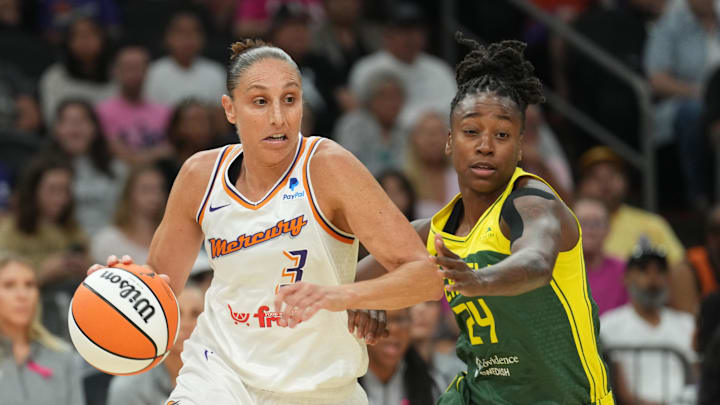 Aug 5, 2023; Phoenix, Arizona, USA; Phoenix Mercury guard Diana Taurasi (3) dribbles against Seattle Storm guard Jewell Loyd (24) during the first half at Footprint Center. Mandatory Credit: Joe Camporeale-Imagn Images