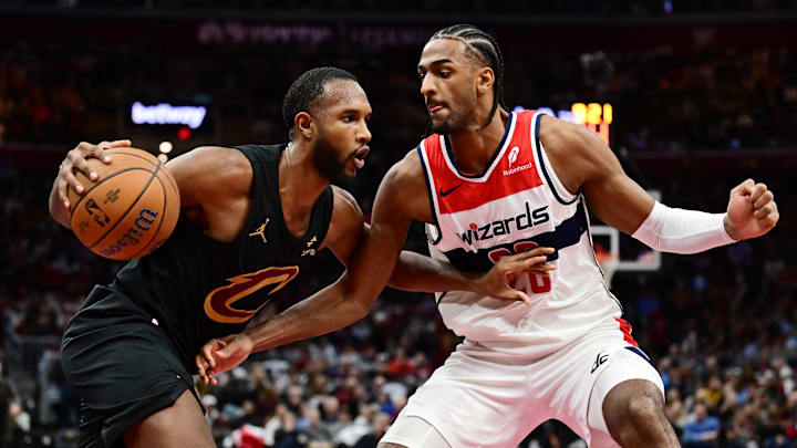 Dec 3, 2024; Cleveland, Ohio, USA; Cleveland Cavaliers forward Evan Mobley (4) drives to the basket against Washington Wizards forward Alexandre Sarr (20) during the second half at Rocket Mortgage FieldHouse. Mandatory Credit: Ken Blaze-Imagn Images Dec 3, 2024; Cleveland, Ohio, USA; Cleveland Cavaliers forward Evan Mobley (4) drives to the basket against Washington Wizards forward Alexandre Sarr (20) during the second half at Rocket Mortgage FieldHouse. Mandatory Credit: Ken Blaze-Imagn Images