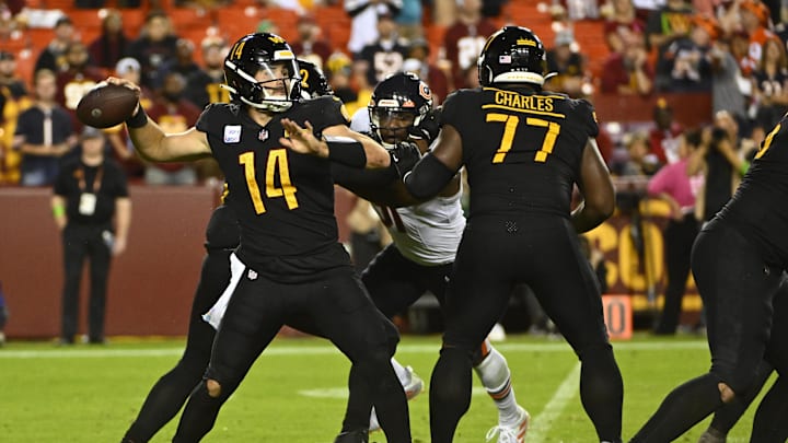 Oct 5, 2023; Landover, Maryland, USA; Washington Commanders quarterback Sam Howell (14) attempts a