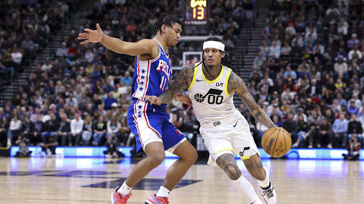 Feb 1, 2024; Salt Lake City, Utah, USA; Utah Jazz guard Jordan Clarkson (00) dribbles the ball against Philadelphia 76ers guard Jaden Springer (11) during the fourth quarter at Delta Center. Mandatory Credit: Rob Gray-Imagn Images
