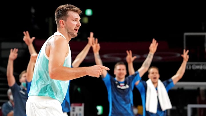 Aug 3, 2021; Saitama, Japan; Slovenia point guard Luka Doncic (77) reacts after a play against Germany in the men's basketball quarterfinal during the Tokyo 2020 Olympic Summer Games at Saitama Super Arena. Mandatory Credit: Kyle Terada-Imagn Images