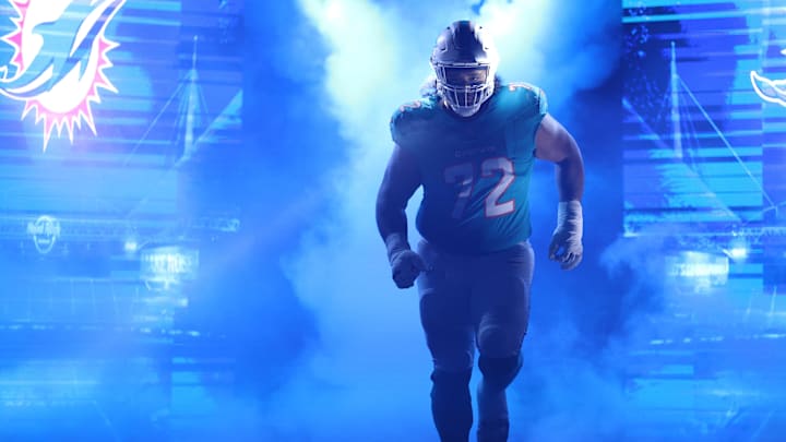 Miami Dolphins offensive tackle Jonah Savaiinaea (72) runs out during player introductions prior to a game against the Baltimore Ravens at Hard Rock Stadium. Miami Dolphins offensive tackle Jonah Savaiinaea (72) runs out during player introductions prior to a game against the Baltimore Ravens at Hard Rock Stadium.