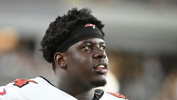 Aug 16, 2025; Pittsburgh, Pennsylvania, USA; Tampa Bay Buccaneers defensive tackle Calijah Kancey (94) watches the action against the  Pittsburgh Steelers during the second half at Acrisure Stadium. Mandatory Credit: Barry Reeger-Imagn Images
