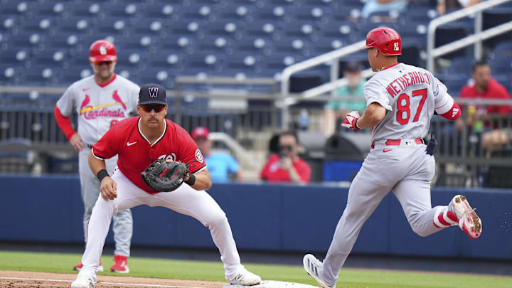 Mar 4, 2025; West Palm Beach, Florida, USA; Washington Nationals first base Nathaniel Lowe (33) tags out St. Louis Cardinals infeilder JJ Wetherholt (87) during the third inning at CACTI Park of the Palm Beaches. Mandatory Credit: Rich Storry-Imagn Images