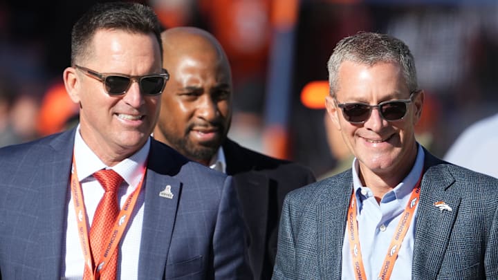 Nov 20, 2022; Denver, Colorado, USA; Denver Broncos CEO Greg Penner (right) and general manager George Paton (left) before the game against the Las Vegas Raiders at Empower Field at Mile High. 