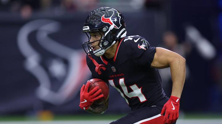 Dec 14, 2025; Houston, Texas, USA; Houston Texans wide receiver Jaylin Noel (14) runs for a gain during the first quarter against the Arizona Cardinals at NRG Stadium. Mandatory Credit: Troy Taormina-Imagn Images
