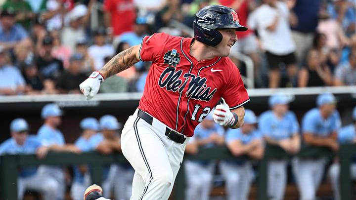 Mississippi Rebels second baseman Dom Decker (12) doubles in a run against the North Carolina Tar Heels during the third inning at Charles Schwab Field. Mississippi Rebels second baseman Dom Decker (12) doubles in a run against the North Carolina Tar Heels during the third inning at Charles Schwab Field.