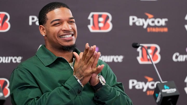 Cincinnati Bengals receiver Ja’marr Chase smiles as he takes questions during a press conference to announce the signing of new contracts for receivers Ja’Marr Chase and Tee Higgins at Paycor Stadium in downtown Cincinnati on Tuesday, March 18, 2025. Chase becomes the new highest-paid non-quarterback player in the NFL.