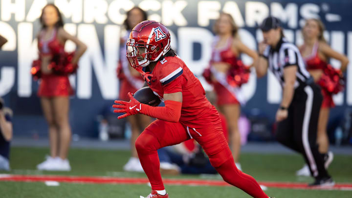 Nov 30, 2024; Tucson, Arizona, USA; Arizona Wildcats wide receiver Jeremiah Patterson (2) against the Arizona State Sun Devils during the Territorial Cup at Arizona Stadium. Mandatory Credit: Mark J. Rebilas-Imagn Images