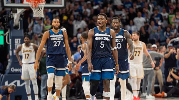 Apr 27, 2025; Minneapolis, Minnesota, USA; Minnesota Timberwolves guard Anthony Edwards (5) looks to the Los Angeles Lakers bench after scoring and picking up a foul in the second quarter during game four of first round for the 2025 NBA Playoffs at Target Center. Mandatory Credit: Matt Blewett-Imagn Images