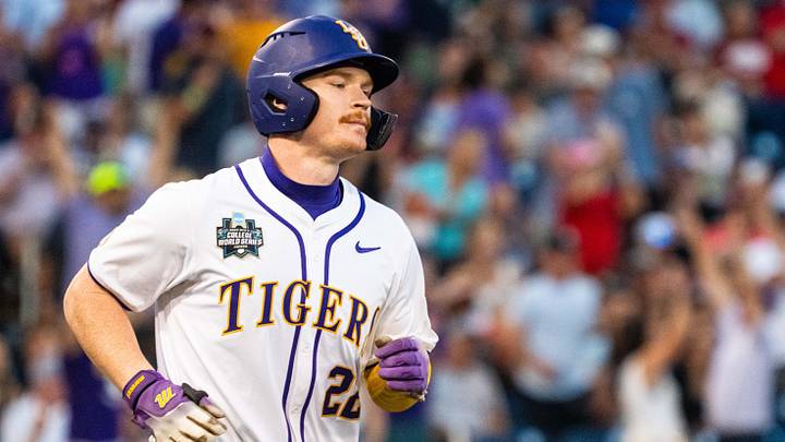 Jun 18, 2025; Omaha, Neb, USA; LSU Tigers first baseman Jared Jones (22) runs the bases after hitting a solo home run against the Arkansas Razorbacks during the eighth inning at Charles Schwab Field. Mandatory Credit: Dylan Widger-Imagn Images Jun 18, 2025; Omaha, Neb, USA; LSU Tigers first baseman Jared Jones (22) runs the bases after hitting a solo home run against the Arkansas Razorbacks during the eighth inning at Charles Schwab Field. Mandatory Credit: Dylan Widger-Imagn Images