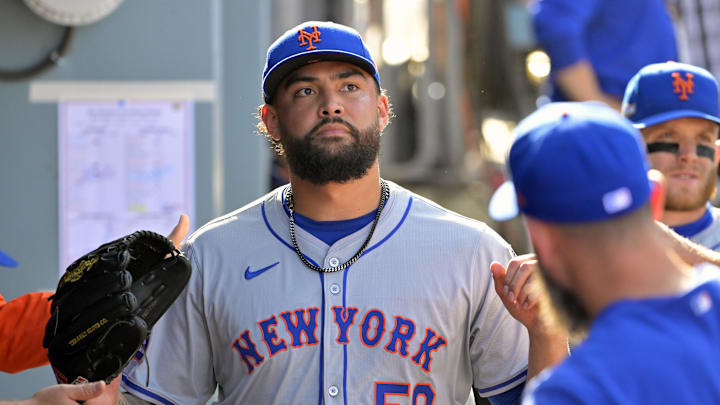 Oct 14, 2024; Los Angeles, California, USA; New York Mets pitcher Sean Manaea (59) greets teammates in the dugout after being relieved in the sixth inning against the Los Angeles Dodgers during game two of the NLCS for the 2024 MLB Playoffs at Dodger Stadium. Mandatory Credit: Jayne Kamin-Oncea-Imagn Images Oct 14, 2024; Los Angeles, California, USA; New York Mets pitcher Sean Manaea (59) greets teammates in the dugout after being relieved in the sixth inning against the Los Angeles Dodgers during game two of the NLCS for the 2024 MLB Playoffs at Dodger Stadium. Mandatory Credit: Jayne Kamin-Oncea-Imagn Images