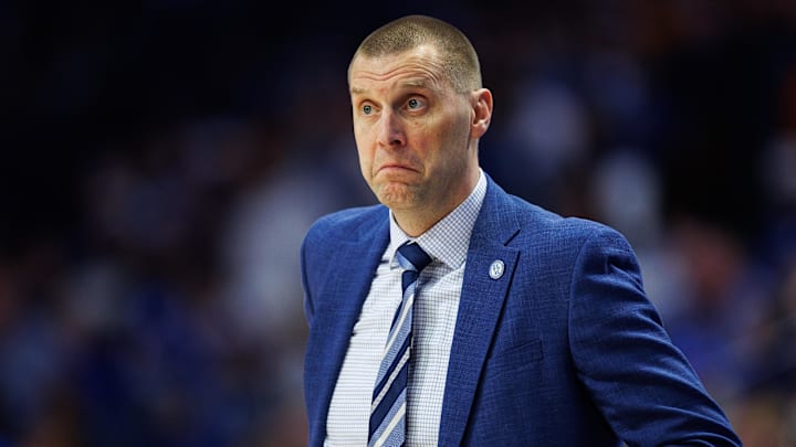 Feb 7, 2026; Lexington, Kentucky, USA; Kentucky Wildcats head coach Mark Pope reacts to the action during the first half against the Tennessee Volunteers at Rupp Arena at Central Bank Center.