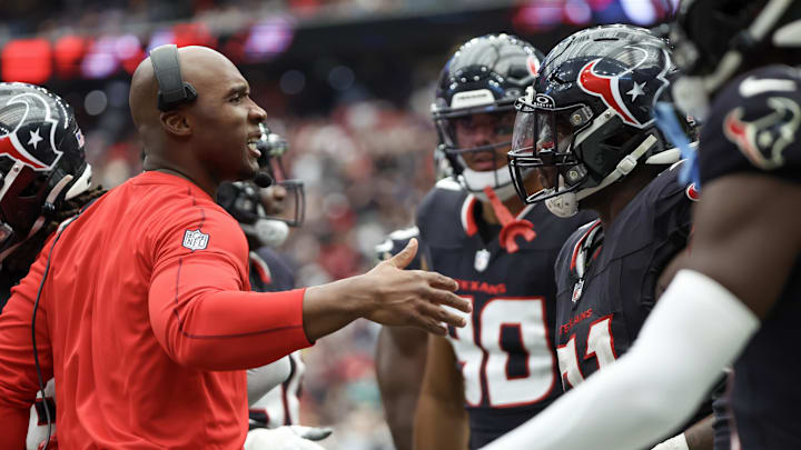 Sep 29, 2024; Houston, Texas, USA; Houston Texans head coach DeMeco Ryans celebrates defensive tackle Folorunso Fatukasi (91) defensive stop against Jacksonville Jaguars quarterback Trevor Lawrence (16) in the second half at NRG Stadium.