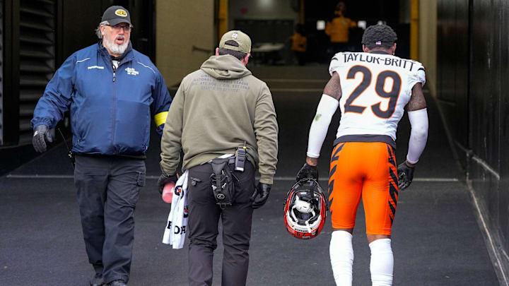 Cincinnati Bengals cornerback Cam Taylor-Britt (29) walks for the locker room with an injury in the second quarter of the NFL Week 11 game between the Pittsburgh Steelers and the Cincinnati Bengals at Acrisure Stadium in Pittsburgh on Sunday, Nov. 16, 2025. The Steelers led 10-6 at halftime.