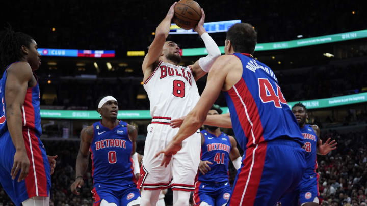 Dec 30, 2022; Chicago, Illinois, USA; Detroit Pistons forward Bojan Bogdanovic (44) defends Chicago Bulls guard Zach LaVine (8) during the second half at United Center. Mandatory Credit: David Banks-USA TODAY Sports
