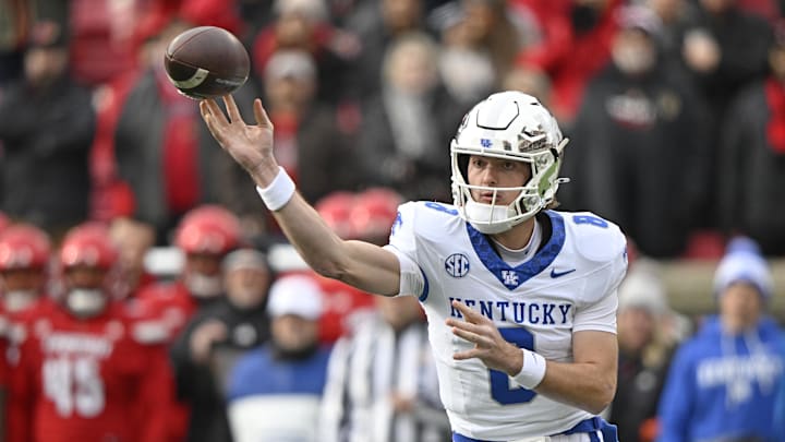Nov 29, 2025; Louisville, Kentucky, USA;  Kentucky Wildcats quarterback Cutter Boley (8) passes the ball against the Louisville Cardinals during the first quarter at L&N Federal Credit Union Stadium. Mandatory Credit: Jamie Rhodes-Imagn Images