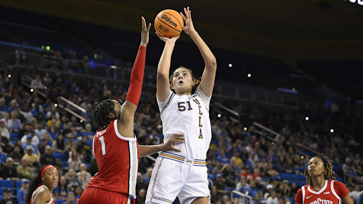 Feb 5, 2025; Los Angeles, California, USA; UCLA Bruins center Lauren Betts (51) shoots over Ohio State Buckeyes forward Ajae Petty (1) during the fourth quarter at Pauley Pavilion presented by Wescom. Mandatory Credit: Robert Hanashiro-Imagn Images