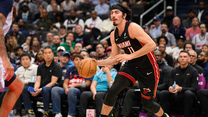 Mar 31, 2025; Washington, District of Columbia, USA; Miami Heat guard Jaime Jaquez Jr. (11) handles the ball during the third quarter against the Washington Wizards at Capital One Arena. Mandatory Credit: Reggie Hildred-Imagn Images