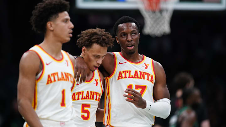 Nov 12, 2024; Boston, Massachusetts, USA; Atlanta Hawks forward Onyeka Okongwu (17), guard Dyson Daniels (5) and forward Jalen Johnson (1) walk to the bench during a break in the action against the Boston Celtics in the second half at TD Garden. Mandatory Credit: David Butler II-Imagn Images