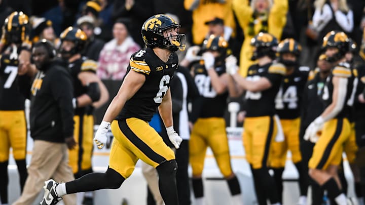Nov 22, 2025; Iowa City, Iowa, USA; Iowa Hawkeyes defensive back Zach Lutmer (6) reacts after making an interception against the Michigan State Spartans during the second quarter at Kinnick Stadium. Mandatory Credit: Jeffrey Becker-Imagn Images