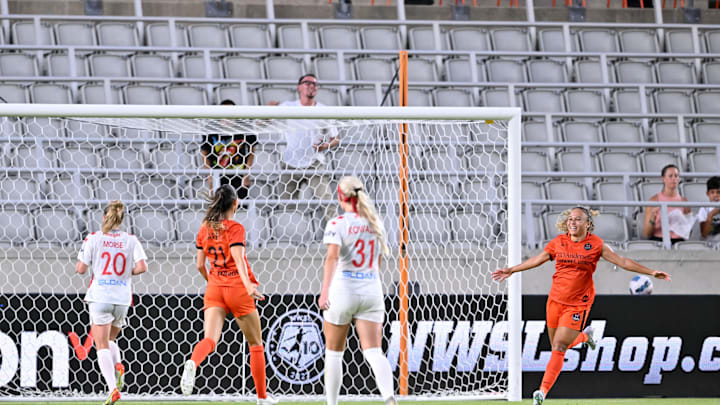 Jul 16, 2022; Houston, Texas, USA;  Houston Dash forward Ebony Salmon (11) reacts after scoring her third goal against the Chicago Red Stars.